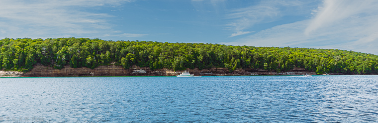 A cruise ship carrying sightseers as along the coast of Picture Rocks National Lakeshore